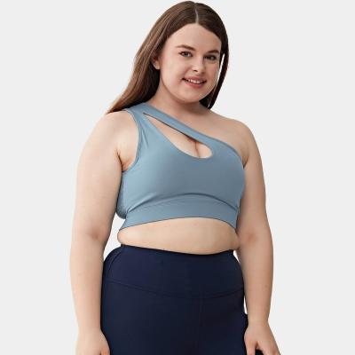 China Breathable Wholesale Custom Recycled Active Wear Fitness Sportswear Cut Asymmetrical Neck Plus Size Sports Bra for sale