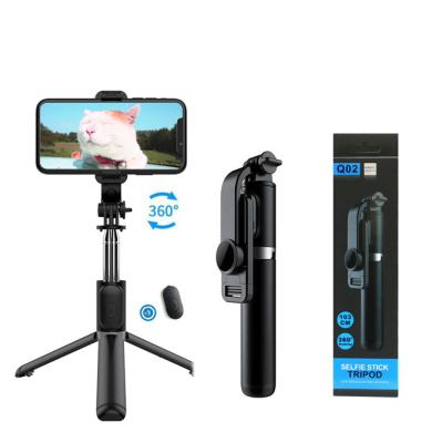 China Fold Up Flexible Portable Lightweight Detachable Radio Selfie Stick Q02 BT Selfie Stick 360 Rotation Extendable Tripod for sale