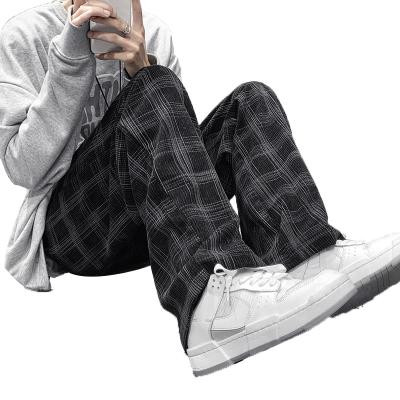 China Autumn Winter Fleece Thicken Casual Loose Waist Straighter Pants Corduroy Plaid Pants Men's Sports Trousers Anti-Static for sale