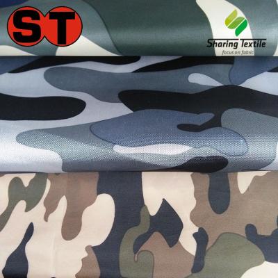 China Polyester Flame Retardant Waterproof Taffeta 63D&66D Camouflage Print 0.18mm PVC Viet Nam Raincoat Fabric $0.48/YD for sale