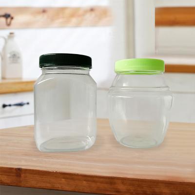 China 350ml 400ml Eco - Friendly PET Honey Jars With Screw Caps , Clear Plastic Cylindrical Food Bottles With Lids for sale