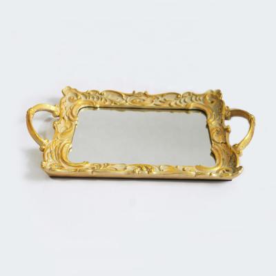 China Luxury Antique Majestic Resin Mirrored Vanity Tray Waved Oval With Unique Handle for sale