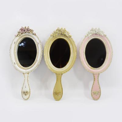 China Decorative Hand Held Mirror Baroque Golden Hand Held Mirror for sale