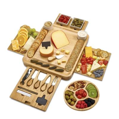 China Sustainable cheese board - 2 ceramic bowls 2 serving plates. Bamboo 4 Drawer Charcuterie Cutlery Knife Set, Round Tray, Markers, Gift for sale