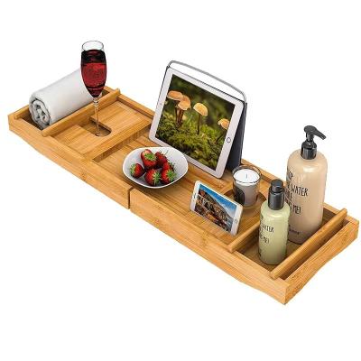 China Sustainable Natural Luxury Expandable Bed Serving Table Bath Tub Caddy Bamboo Tray With Foldable Legs for sale