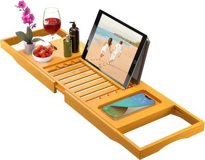 China Factory Best Selling Sustainable Luxury Bamboo Bathtub Tray Caddy Wood Bath Tray With Sides Book Tablet Phone Wine Glass Expanding Holder for sale