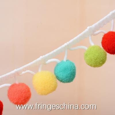 China Multicolored Wholesale Beautiful Trimmings Pom Pom  Balls Tassels Fringes for sale