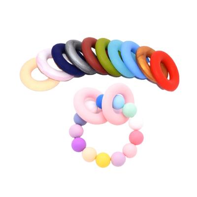 China Wholesale Custom BPA Free Food Grade Soft Baby Teething Toy Ring Teether Donut Silicone Beads for sale