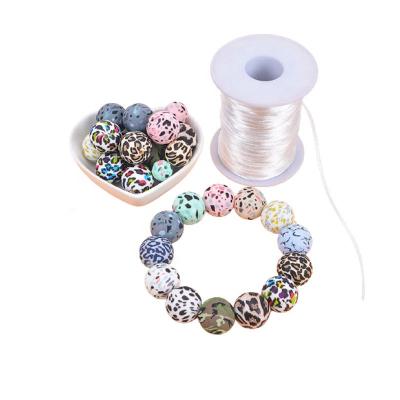 China Bpa Free Leopard Teether Supplies Mix Dual Hole 19mm Kits Printed Clip Clip Silicone Loose Beads Custom for sale