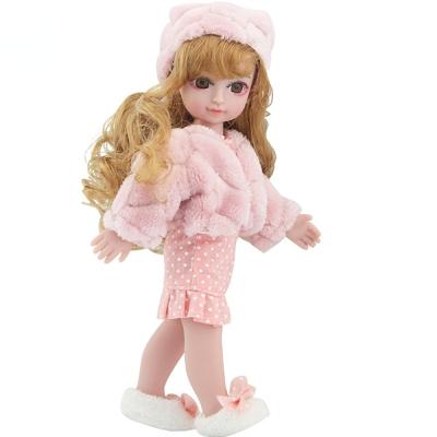 China Mini Toy 2021 New 10 Inch Soft Plastic Doll Toys For Lovely Babies Vinyl Doll In Fashion Wearing for sale