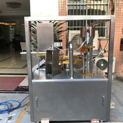 China Automatic Rotary Cup Food Honey Spoon Filling Sealing Machine for sale