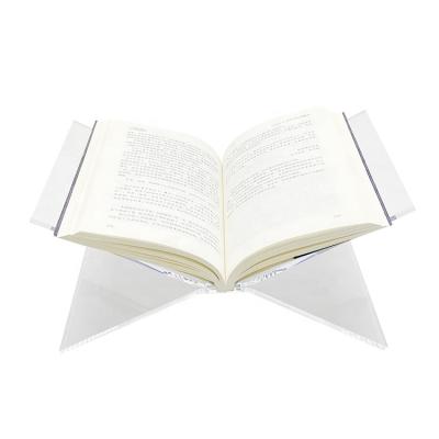 China Handmade Luxury Desktop Reading X Transparent Open Shape Acrylic Book Display Stand Holder for sale