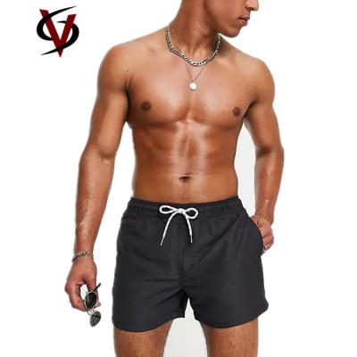 China Custom Men's Swimming Trunks Beach Shorts 100% Polyester Quick Dry Swim Shorts in Black for sale