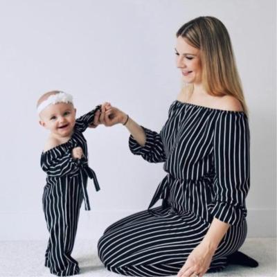 China Matching Family Casual Clothing Anne Kiz Giyim Off Shoulder Black Striped Full Skirt Long Printed Mum and Daughter One Piece Overalls for sale