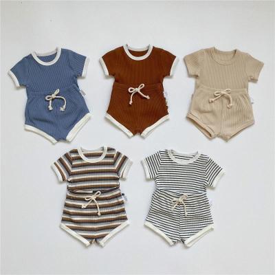 China Anti-Shrink Wholesale Custom Logo Summer 100% Organic Cotton Baby Boy Clothing Set Printing Pocket Sleeveless Hoddie Outfit for sale