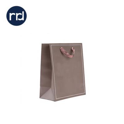 China Recyclable RR Donnelley T Shirt Garment Fabric Custom Printed Paper Shopping Bags for sale