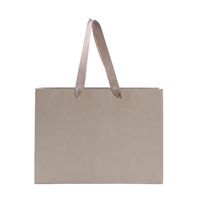 China 2020 RRD High Quality Recyclable Paper Flower Gift Bag Tote Bag Packaging Shopping Bag With Handle for sale