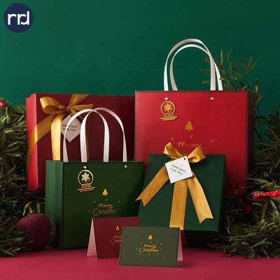 China RR Donnelley Style Recyclable Luxury Fashionable Shopping Gift Packaging Paper Bag Custom Tote Bag With Logo for sale