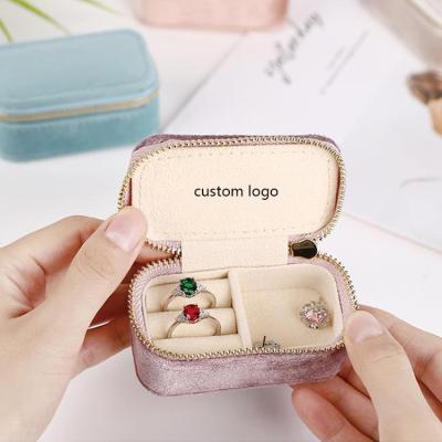 China Mini Custom Logo Travel Jewelry Box Handmade Portable Jewelry Ring Zipper Velvet Storage Case Small Velvet Necklace Packaging Box for sale