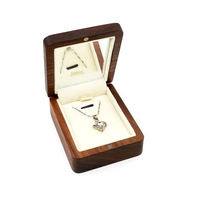 China Hot-selling solid wood handmade high-grade pure magnetic button storage box necklace advanced opening and closing sense for sale