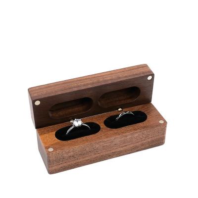 China Handmade Custom Your Own Logo Solid Walnut Wood Ring Holder for 2 Rings Engagement Proposal Wedding Jewelry Box for sale