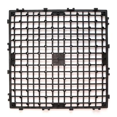 China WPC Tile Interlocking Snap-in Easy Click Recycled Plastic Grid Paving Lock Base For Composite Wood Plastic Wpc Deck Tiles for sale