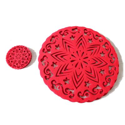 China Sustainable Set Of 4 Round Shape Red Snowflake Die Cut Anti Skid Felt Christmas Place Mat for sale