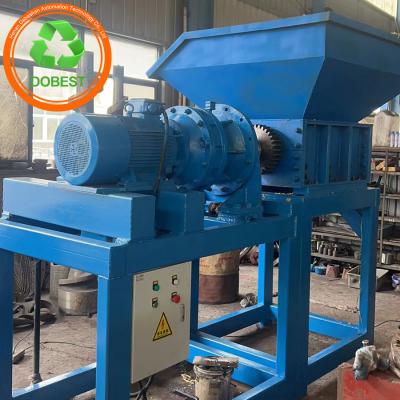 China Multifunctional Scrap Heavy Melting Pvc Hdpe Pp Pet Scrap Dual Shaft Single Motor Shredder for sale