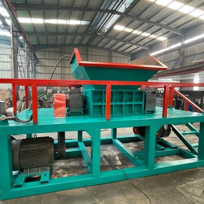 China Reflective Film Twin Shaft Hob Shredder Design for Waste Textile and Old Fishing Net for sale