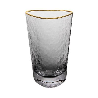 China Modern solid color triangle water glass with hammer design and gold rim for sale