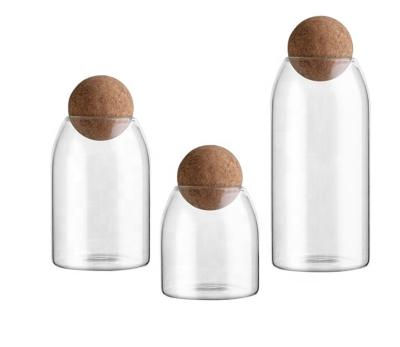 China Microwavable Glass Jar For Storage Food Storage Jars With Lid Cork Ball Stopper Handmade Borosilicate Wooden Jars Glass for sale