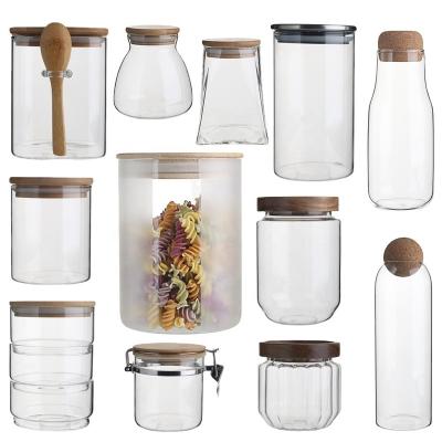 China Wholesale Microwavable Airtight Kitchen Borosilicate Glass Jar Office Storage Empty Food With Bamboo Wooden Lid Bulk Jar Glass for sale