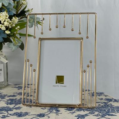 China Latest Nordic Selling Birthday Frame Metal Iron Table Gold Plated Wall Picture for sale