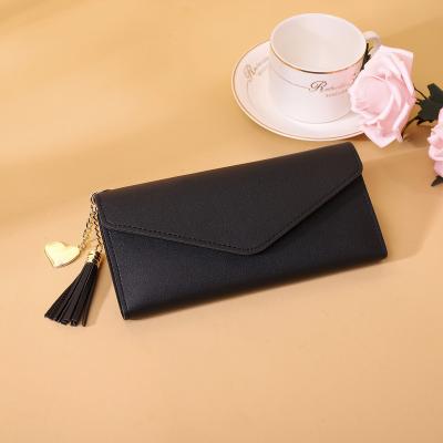 China Waterproof new clutch bag with tassels and small gold hardware purse, European, American and Asian hot styles for sale