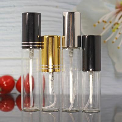 China 5ml 10ml Transparent Glass Bottle Perfume Stock Cosmetic Bottle Small Trial Bottling With Black Gold Silver Perfume Spray Bottle for sale