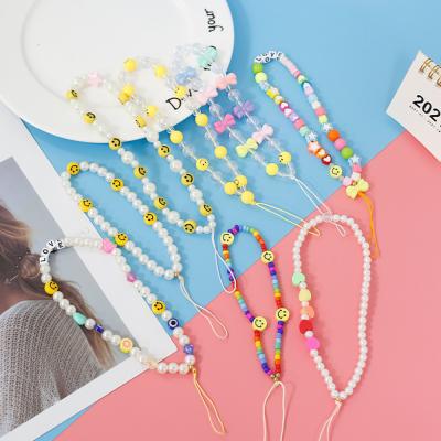 China Ldyllic Pearl Rice Pearl Imitation Mobile Phone Lanyard Holiday Style Rainbow Color Mobile Phone Plastic Chain Case for sale