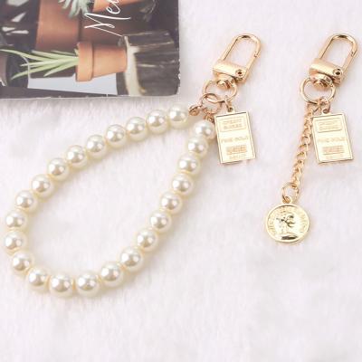 China Fashion MELLON Monochrome Pearl Chain Earphone Shockproof Retro Square Round Coin Pendant Case For AirPods Pro AirPods Case for sale