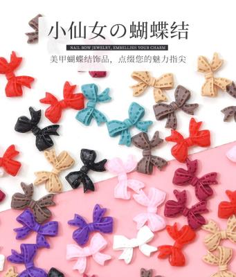 China Nail charms nail art bow red black and white jewelry simple and flexible three-dimensional hollow nail decoration for sale