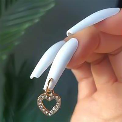 China Nail Charms Nail Art Love Nail Metal Hollow Shape Alloy Pendant Heart Stereo Diamond Nail Charms Instant Decoration for sale