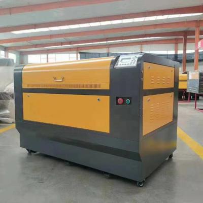 China 50w/60w/80W Laser Cutting Machine CNC CO2 Water Cooled Laser Engraving Cloth Acrylic Metal and Nonmetal Machinery Factory Price for sale