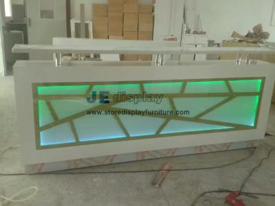 China Customized Millwork Reception counters in white wood structure inlay Acrylic panel with Variable color LED light for sale