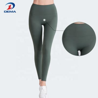 China Breathable High Quality Dema High Waist Yoga Pants No Front T Line Spandex Nylon Yoga Pants Fitness Yoga Leggings Athleisure Wear Women for sale