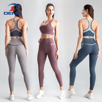 China Women's Breathable 2 Piece Workout Set Gym Yoga Fabric Sports Tank Top Bra And High Waist Leggings Workout Suit for sale