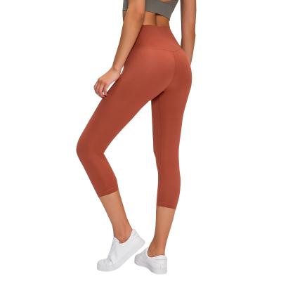 China Breathable New Sports Solid Color Peach Buttocks Yoga Pants High Waist Tight High Waisted Peach Buttocks Yoga Pants Gym Workout Women Sportswear Gym Workout Shorts for sale