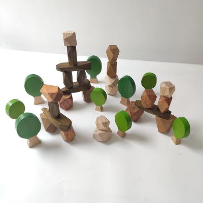 China Construction Toy Well Finished Nature Stone Shaped Wooden Blocks Kindergarten Educational Early Learning Educational Supplies à venda