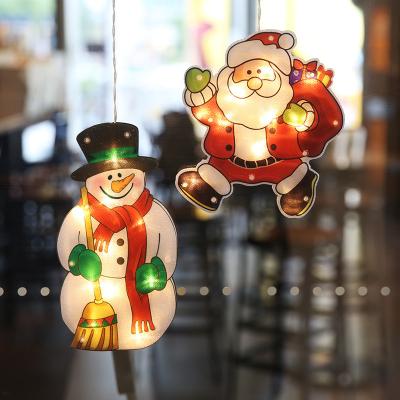 China Modern PVC Santa Claus Snowman Hanging Sucker Window Christmas Decoration Light for sale