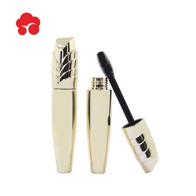 China Cosmetic 18.5ml empty gold mascara tube packaging with unique cap for sale