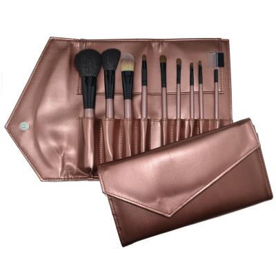 China Angular Blush Professional 2019 Cosmetic Brush Set With Roll Bag Rose Gold Cosmetic Brush Set for sale