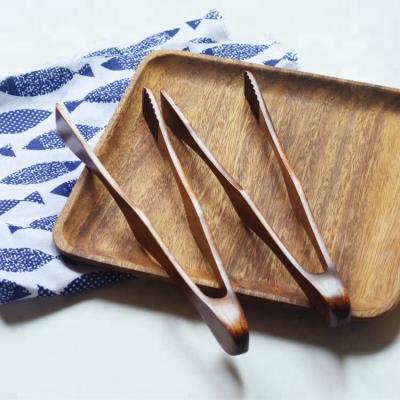 China Sustainable Natural Wood Color Beech Material Kitchen Baking Toaster Serving Tool Food Tongs Bread Wooden Tongs for sale