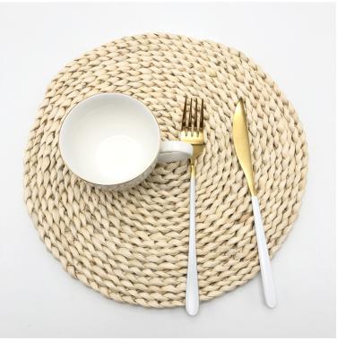 China Sustainable Natural Round Handmade Corn Husk Place Mat Tea Coffee Braiding Heat Insulating Coaster for sale